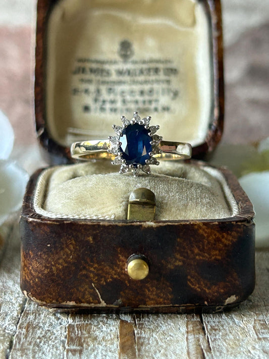 Vintage Oval Sapphire and Diamond Halo Ring 9 Carat Yellow Gold