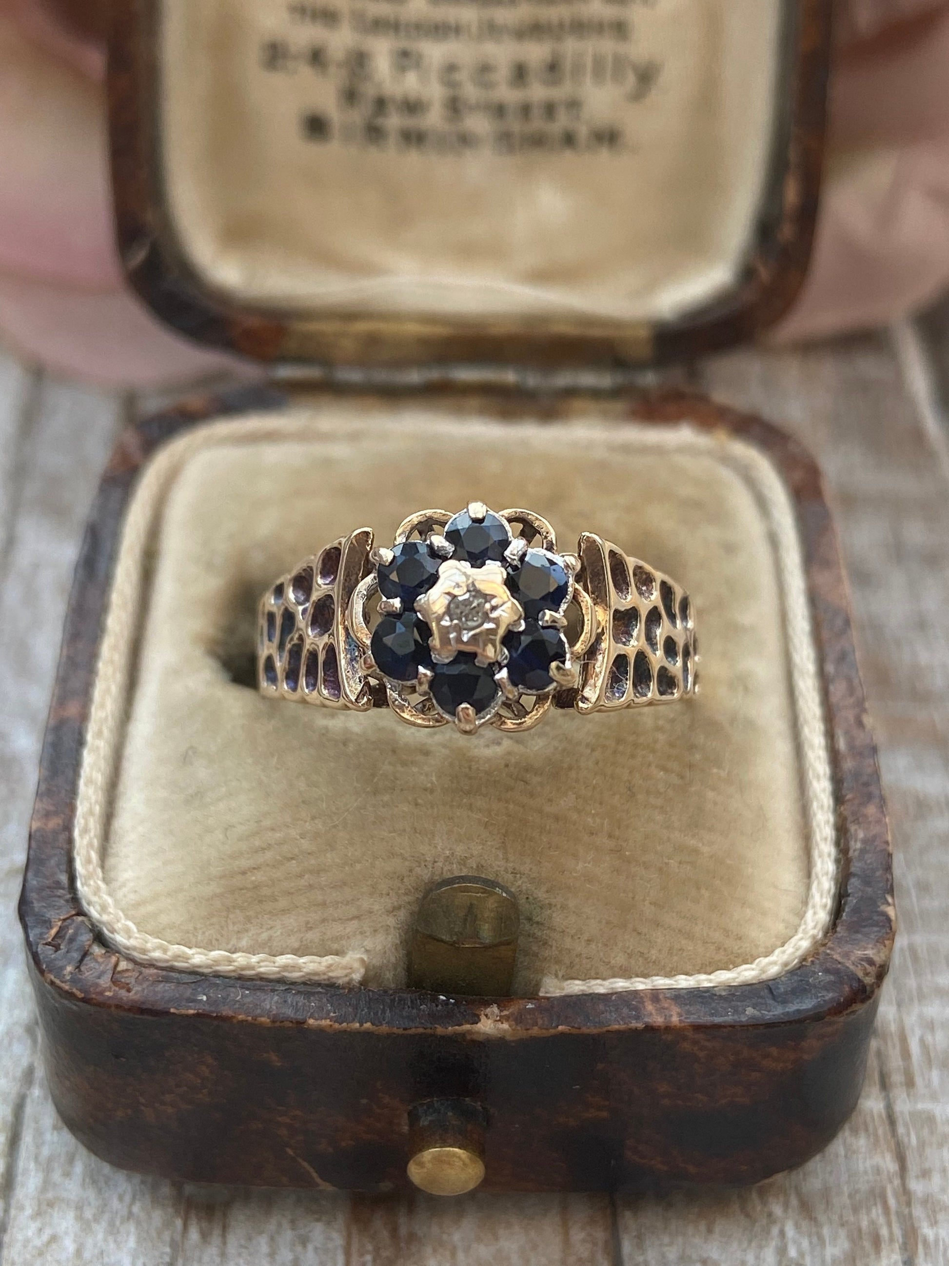 Vintage sapphire and diamond daisy ring 9 carat gold